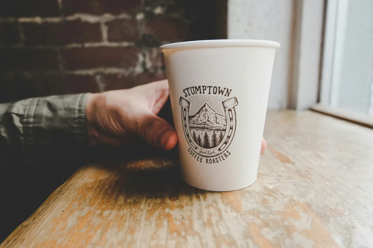 Close up photo of a Stumptown Coffee Roasters coffee cup.