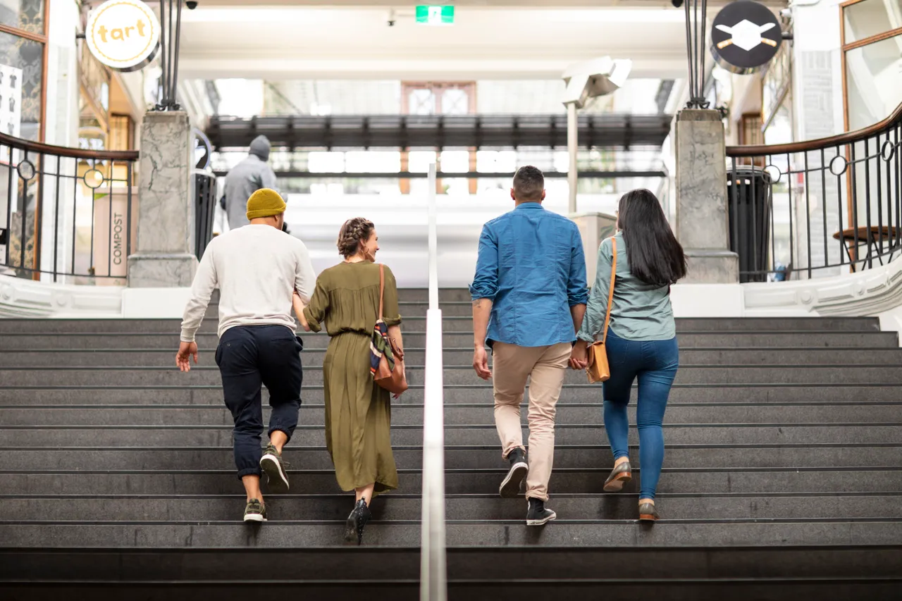 Friends walking up the stairs