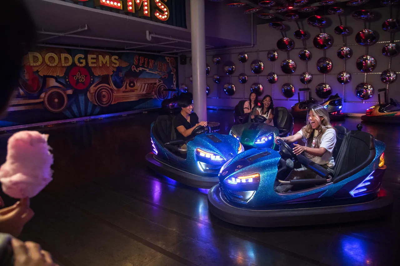 People having fun riding bumper cars