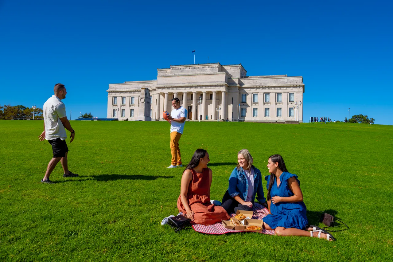 Group relaxing in Auckland Domain